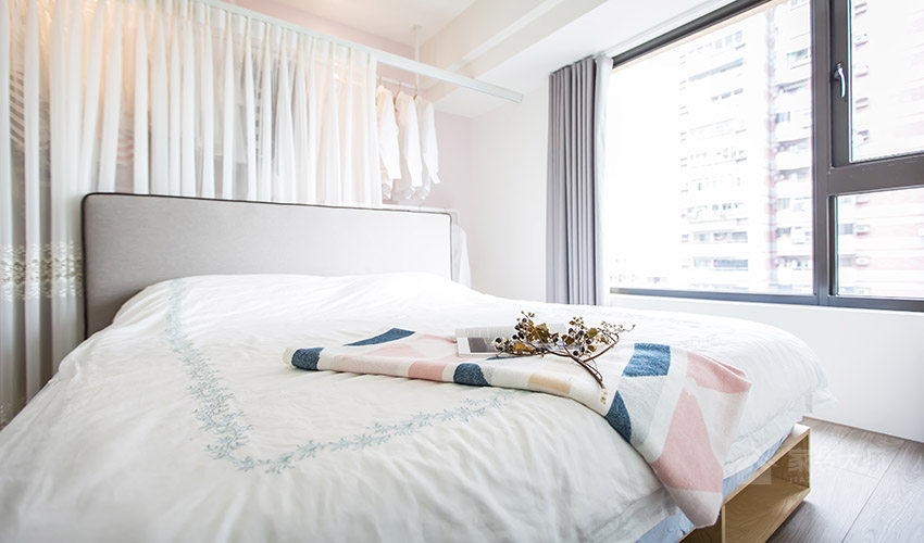 現代簡約臥室布藝雙人床圖片